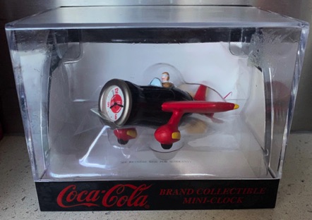 3106-1 € 17,50 coca cola mini klok vliegtuig.jpeg
